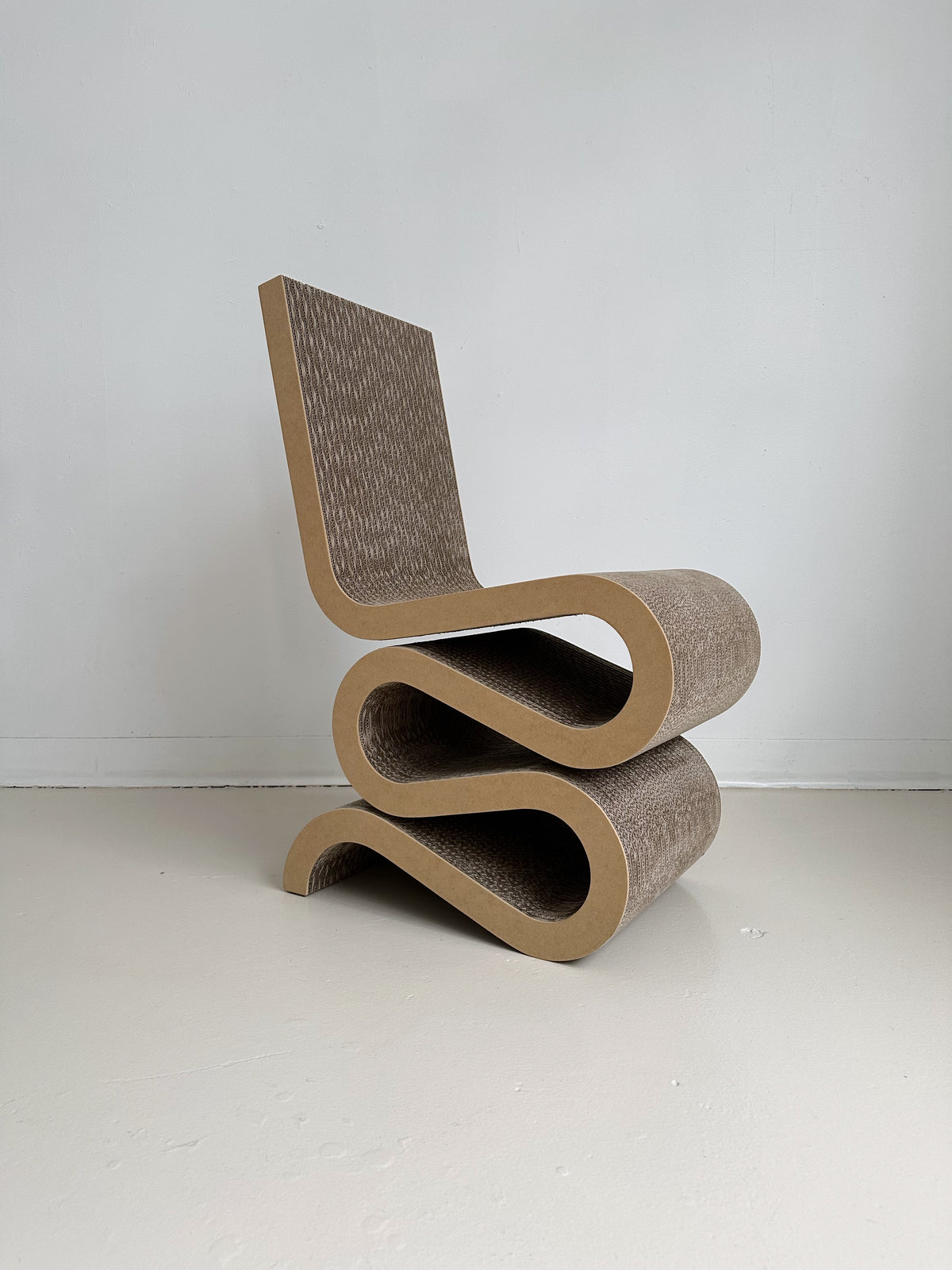 WIGGLE SIDE CHAIR BY FRANK GEHRY FOR VITRA, 70's | Maison Singulier