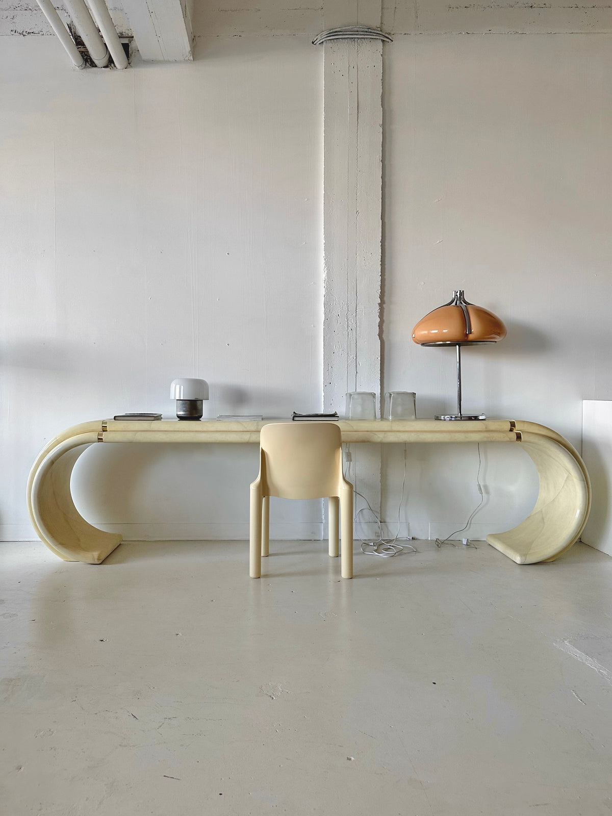 LACQUERED SCROLL CONSOLE TABLE IN THE STYLE OF KARL SPRINGER