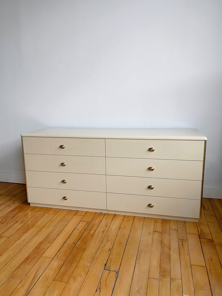 CREAM LACQUERED DRESSER WITH BRASS ACCENTS