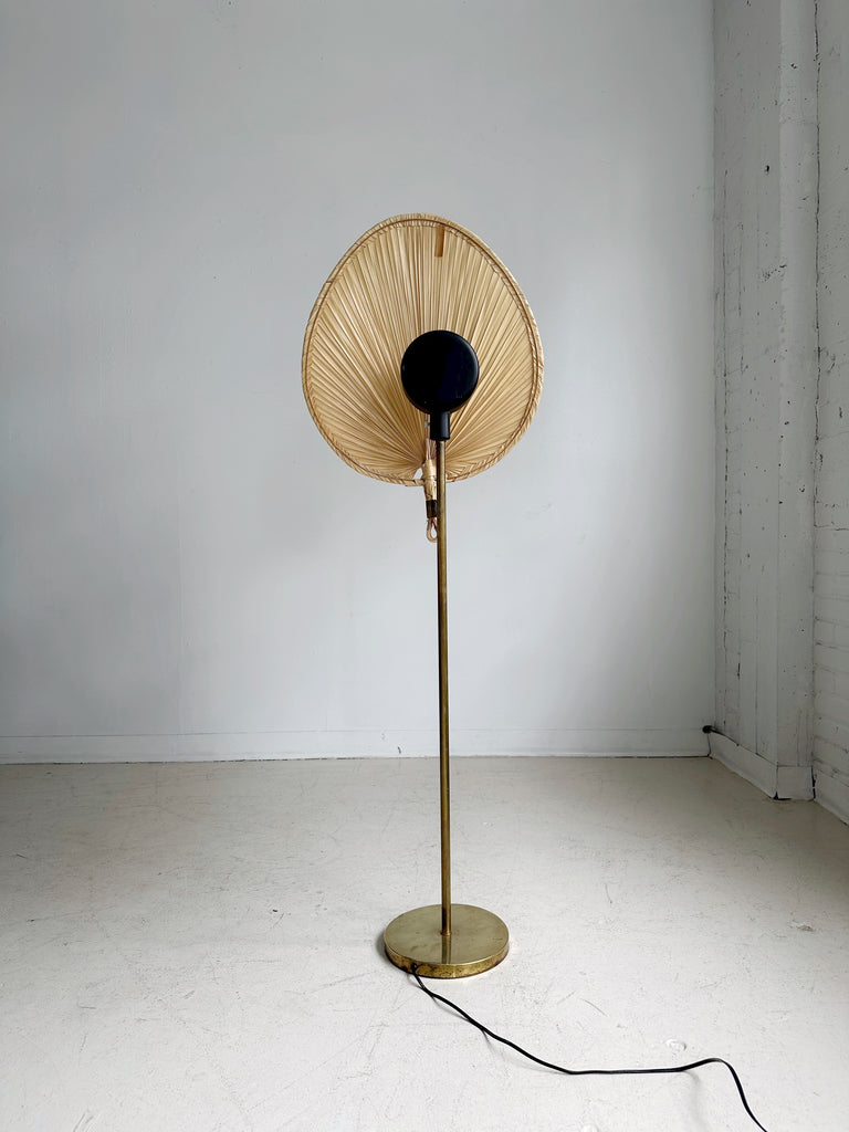 BRASS FLOOR LAMP WITH PALM LEAF SHADE IN THE STYLE OF INGO MAURER