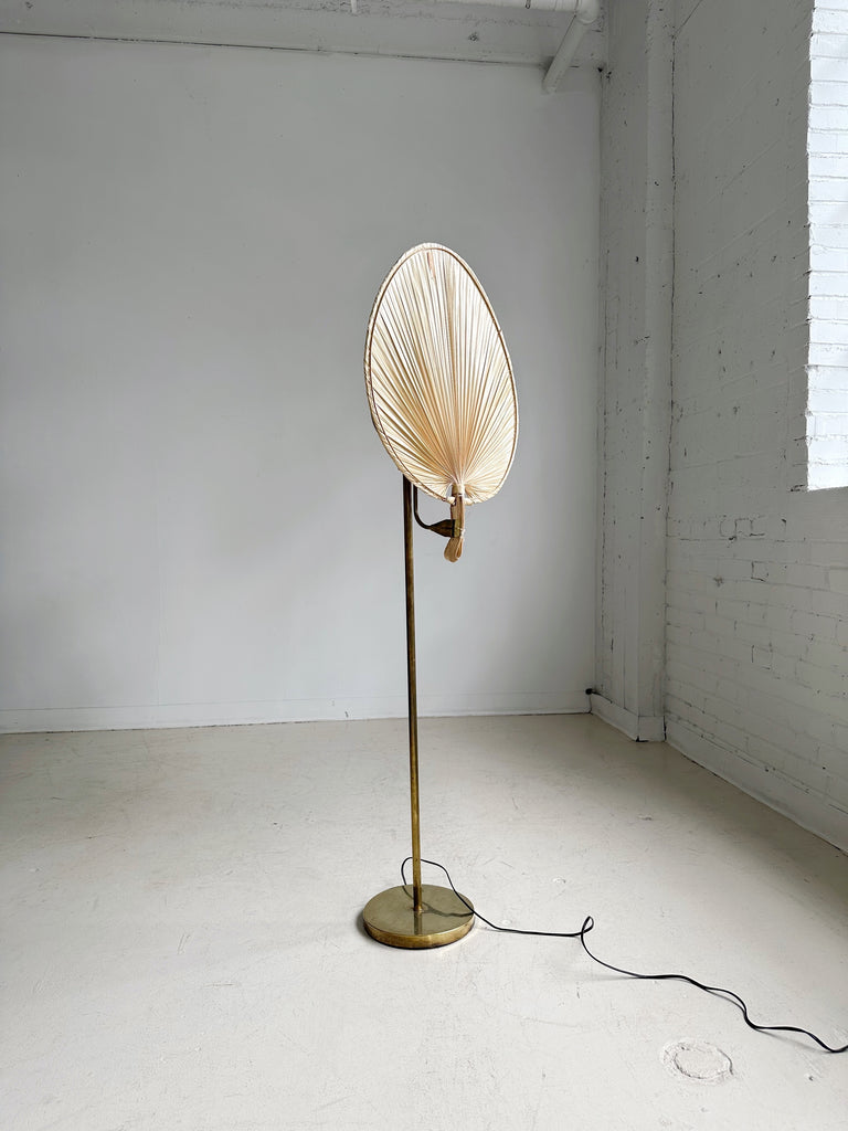 BRASS FLOOR LAMP WITH PALM LEAF SHADE IN THE STYLE OF INGO MAURER