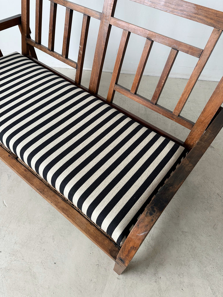 ANTIQUE ARTS AND CRAFTS WOOD & CANE BENCH WITH STRIPED SEAT CUSHION