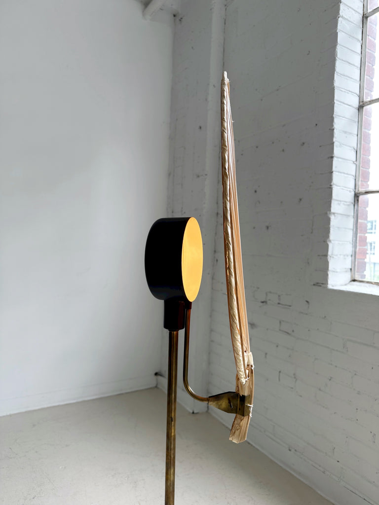 BRASS FLOOR LAMP WITH PALM LEAF SHADE IN THE STYLE OF INGO MAURER