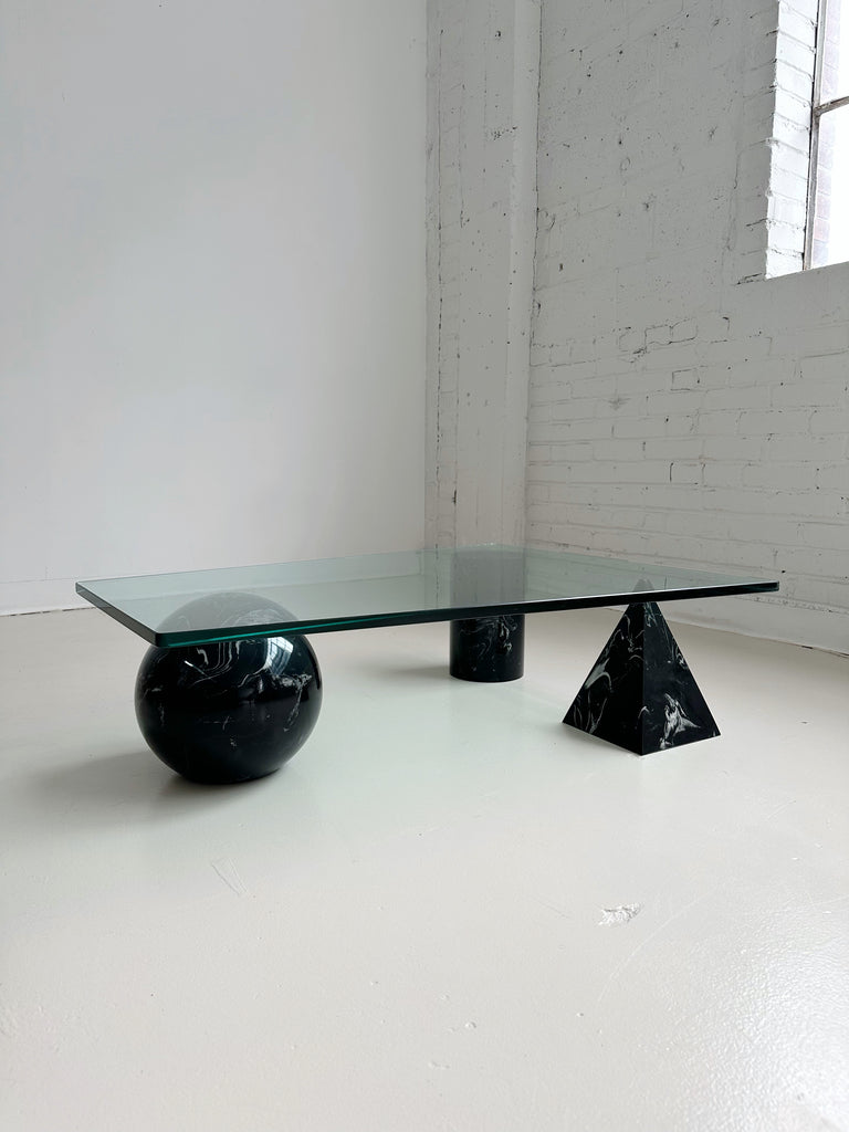GLASS COFFEE TABLE WITH GEOMETRICAL BASE