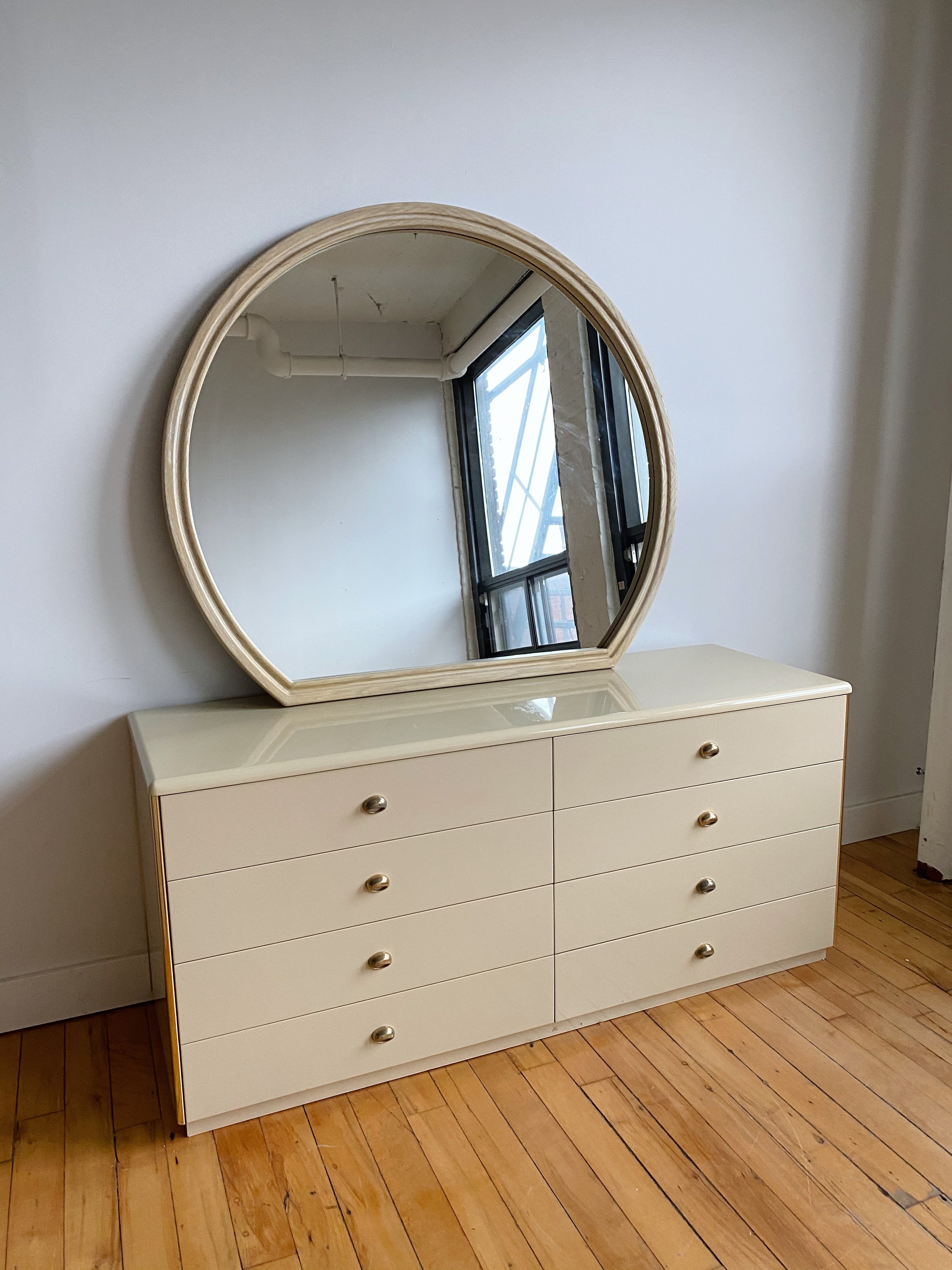 CREAM LACQUERED DRESSER WITH BRASS ACCENTS