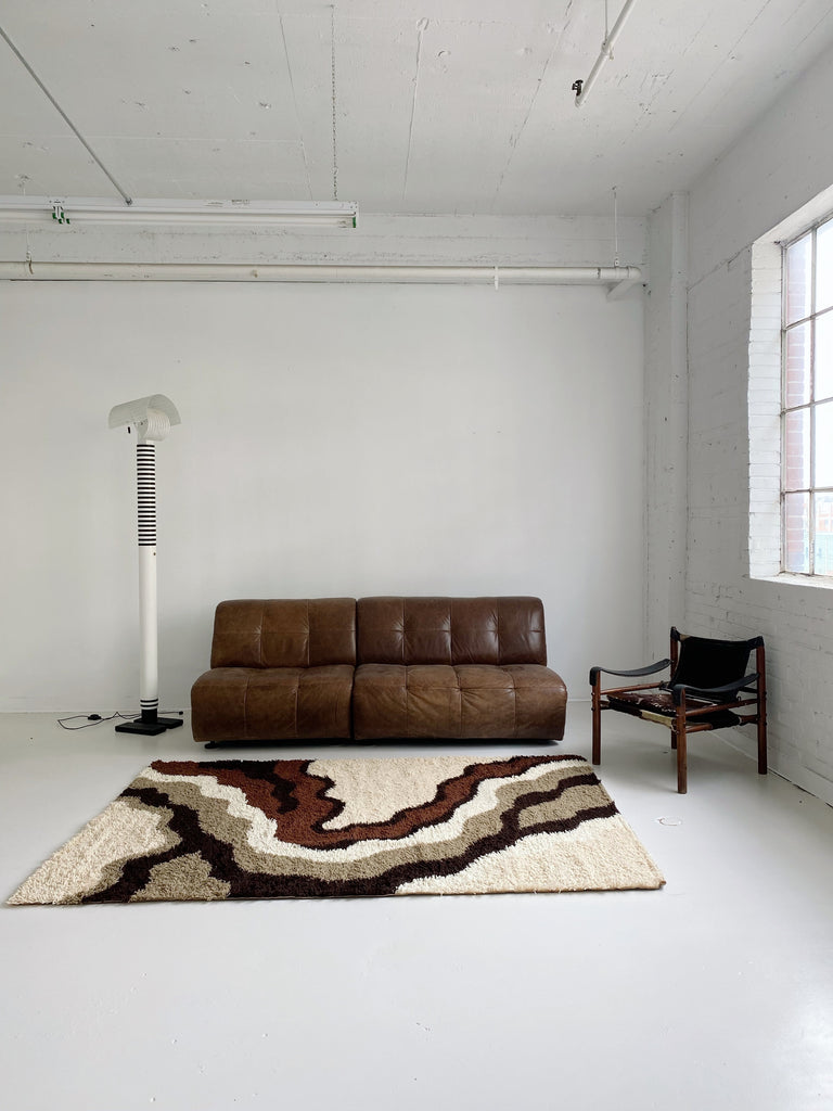 BROWN LEATHER TUFTED TWO PIECE SOFA