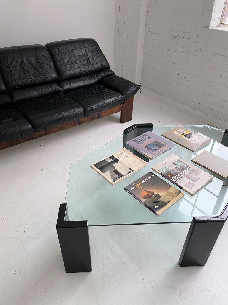 TRAPEZOID GLASS COFFEE TABLE WITH LACQUERED BLACK LEGS