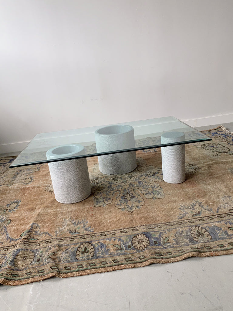 GLASS COFFEE TABLE WITH CYLINDRICAL CEMENT BASE