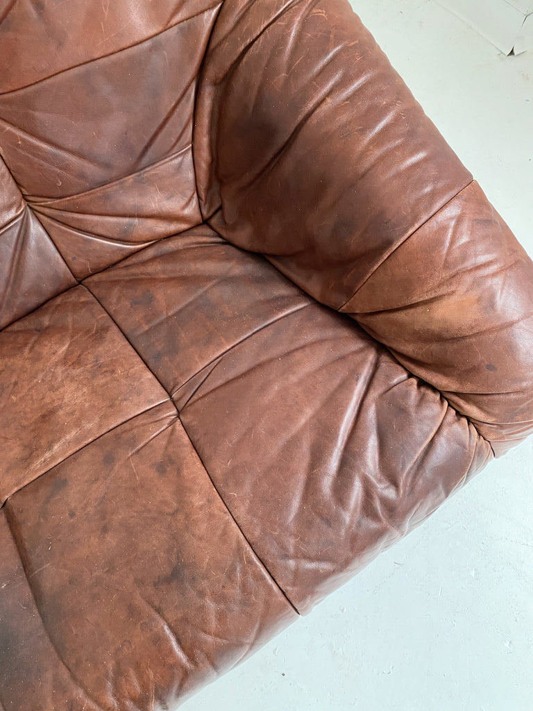 BROWN LEATHER LOVESEAT WITH WOODEN FRAME