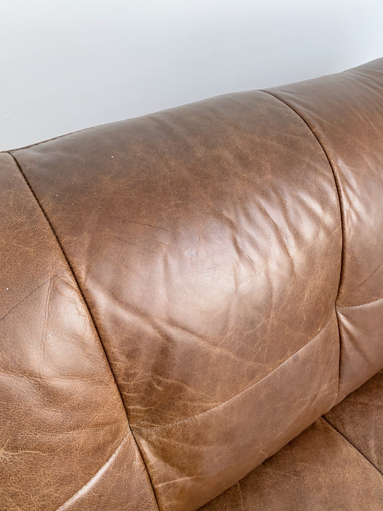 BROWN LEATHER TUFTED TWO PIECE SOFA